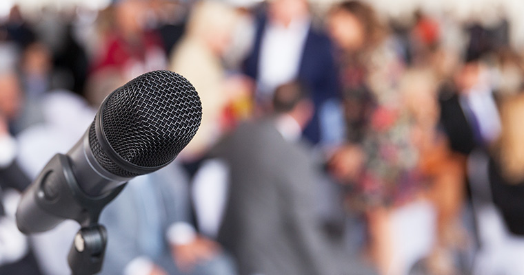 Microphone in front of a crowd