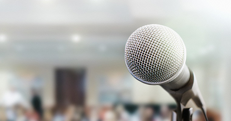 Microphone in front of a crowd